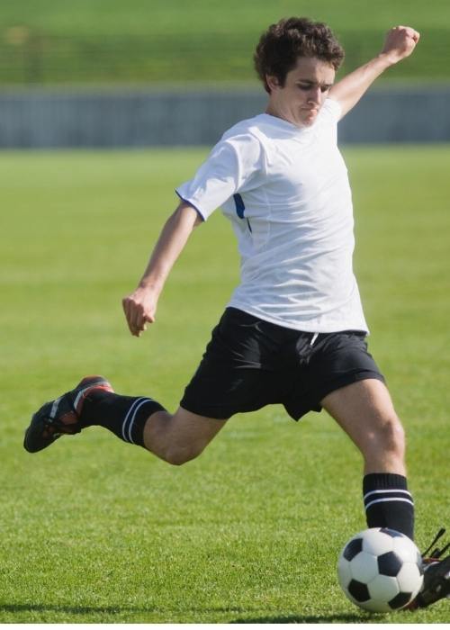 IV Therapy | A Football Player kick the Football